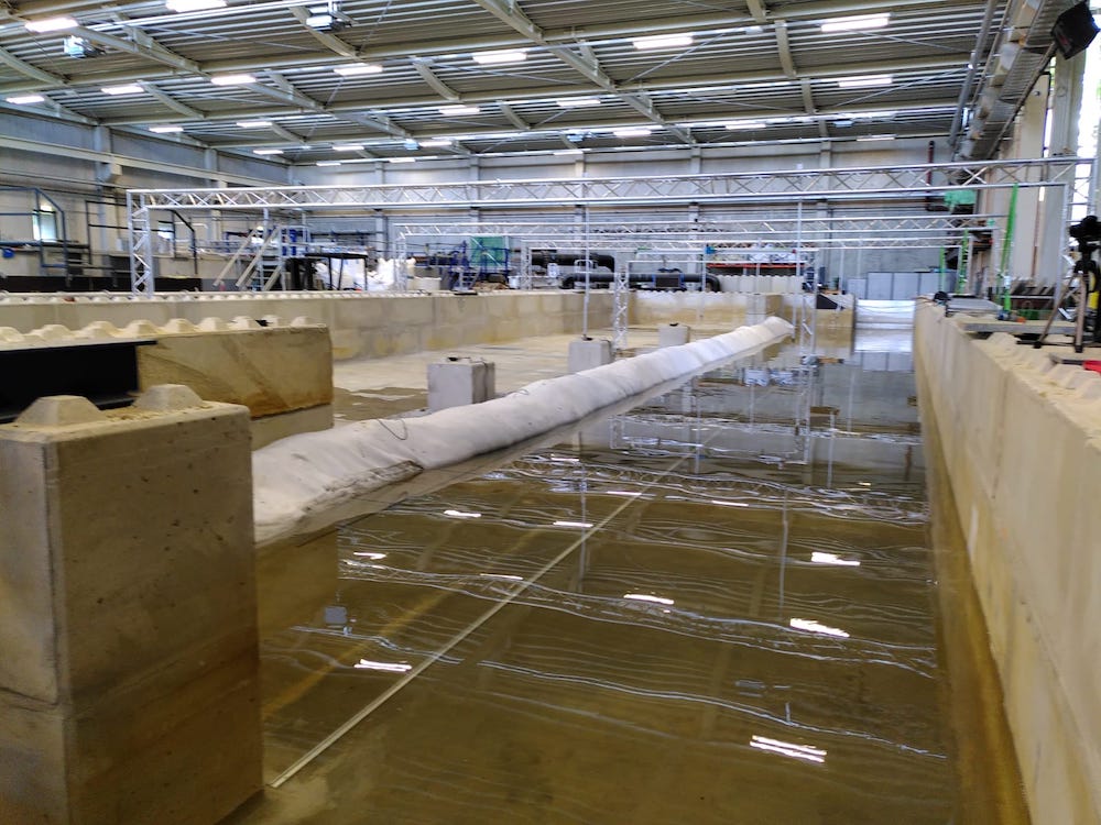 topopacker building a flood protection wall